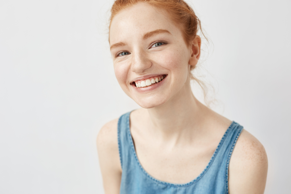 sincere-ginger-woman-smiling.jpg