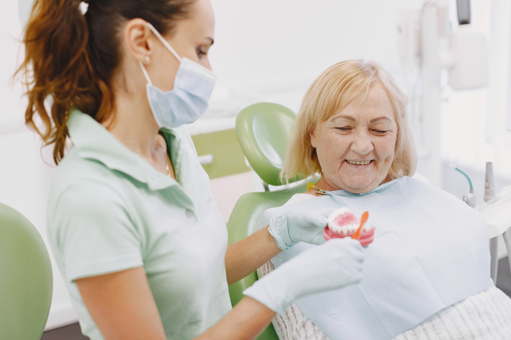 senior-woman-having-dental-treatment-dentist-s-office-woman-is-being-treated-teeth.jpg
